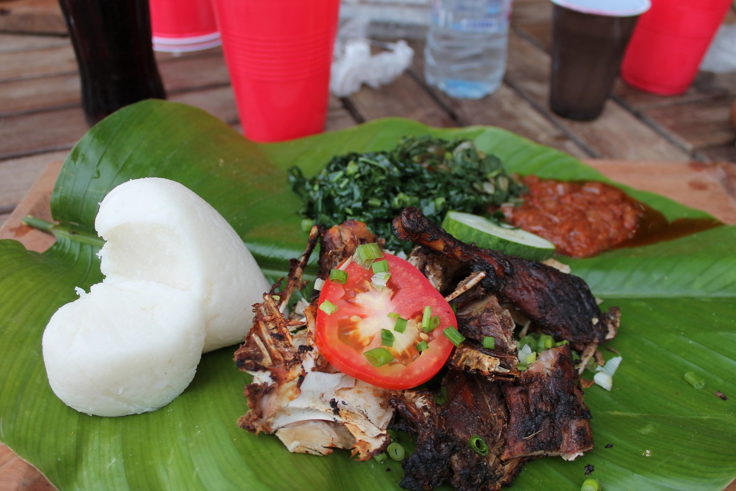 Sadza, vegetables and guinea fowl
